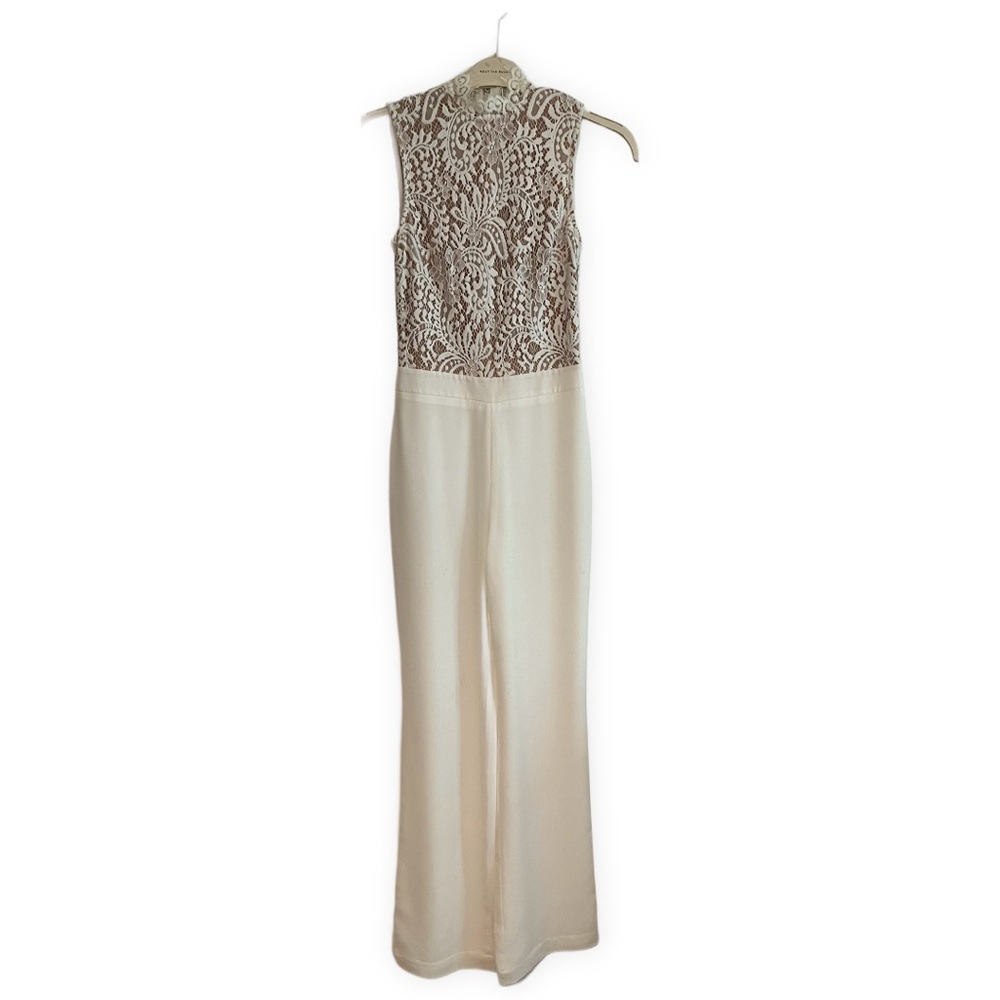 Misha Collection white lace jumpsuit.
